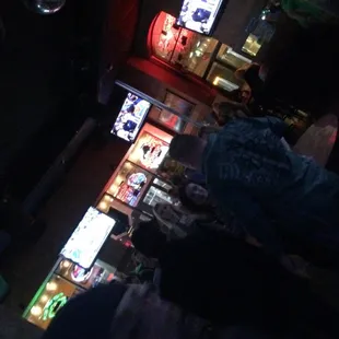 a man standing at a bar