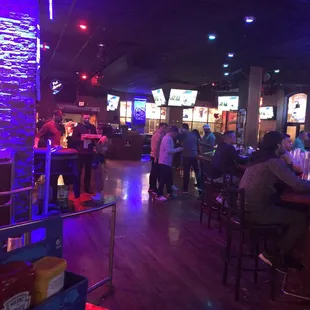people sitting at the bar