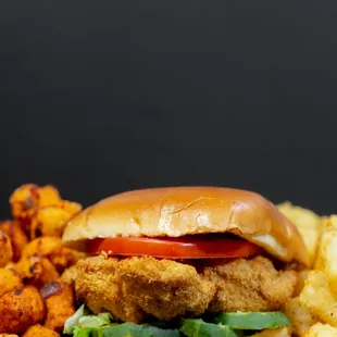 Our Homestyle Chicken Sandwich is paired with your choice of sweet potato tots or regular tots!