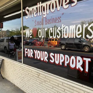 a sign in the window