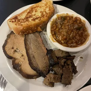 3 meat combo, brisket, turkey, burnt ends with smoked baked beans.