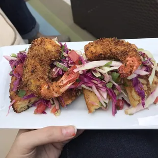 Jumbo shrimp on cornbread. Excuse my thumb. I have no excuse for that.