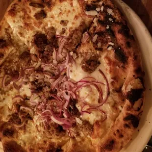 Sausage fennel pizza. Good the next day too.