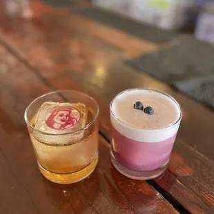 two drinks on a wooden table
