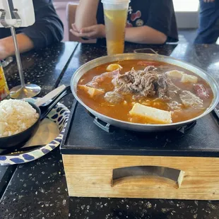 Complimentary white rice with hot pot.