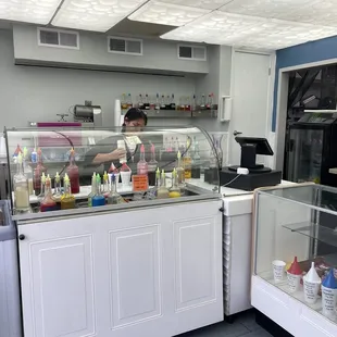 a woman behind the counter