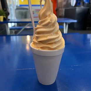 Orange dole whip with cream