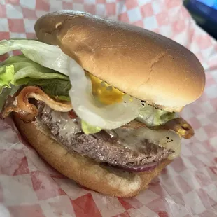 Possibly ground cat burger with bacon.