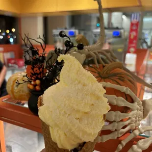 Vegan Pineapple soft-serve with coconut shreds &amp; chocolate with cacao nibs