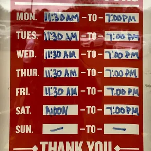 a business hours sign
