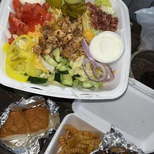 a meal in a styrofoam container