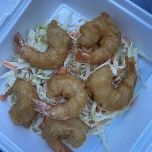 Undercooked shrimp on yellowed &amp; limp coleslaw