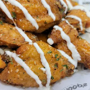 a plate of chicken wings