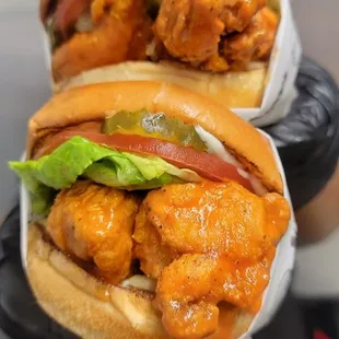 XXX Chicken Tender Sandwich ( XXX Tenders, Fresh Greens, tomatoes, Pickles topped with Ranch dressing and Snoop&apos;s Secret Sauce.