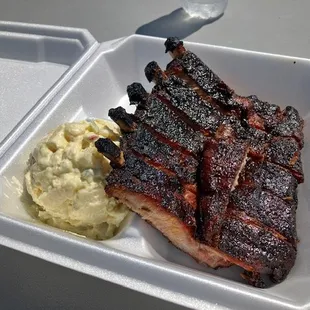 Yum. All of the sides are good, but I usually fill up on ribs! (extra sauce available for those who want it)