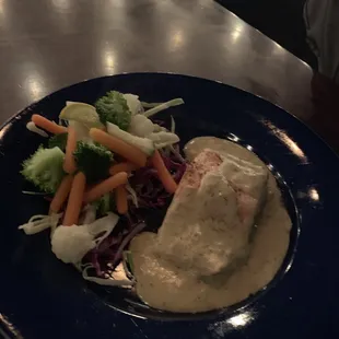 Poached salmon with vegetables