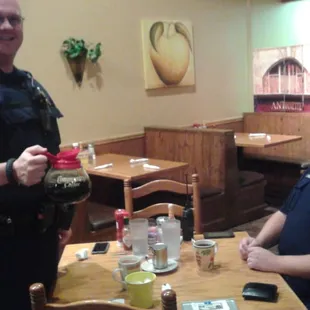 Keeping coffee full.