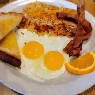 Traditional with 2 Sunnyside up eggs, bacon, hashbrowns, and white toast.