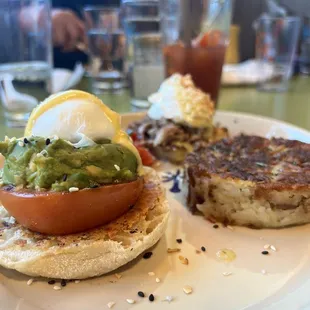 Half Benedict with avocado (left) and chili verde (right)