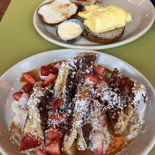 OMG French Toast /  Sandwich I Am ( Pretzel roll filled with eggs, cheese &amp; sausage  )