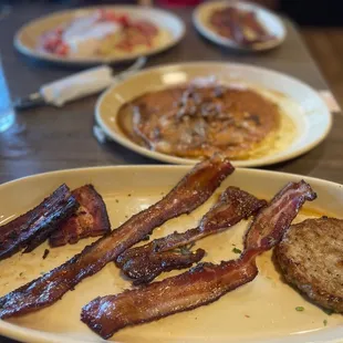 Flight of bacon, sausage and cinnamon swirl pancake