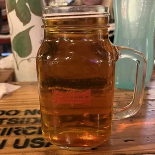 a jar of tea on a table