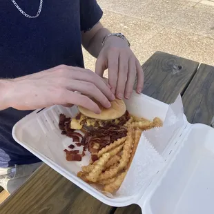 Plain cheeseburger with just bacon with side of fries. Tons of bacon!
