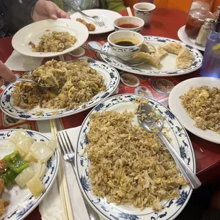 Combo fried rice, sweet and sour chicken, steamed dumplings, plain fried rice, and genera tso chicken.