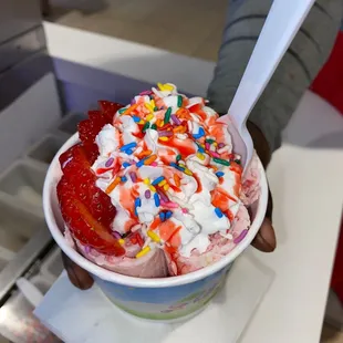 Strawberry banana (pink banana) w (Fresh strawberries, whipped cream, rainbow sprinkles, strawberry syrup)