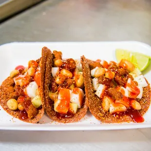three tacos on a plate