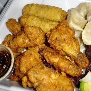 Pupu Tray. Dumplings and Chicken Wings - not included. © 2006 @FOODEMIC.