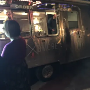 a woman ordering food