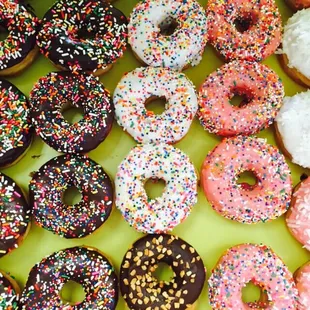 a variety of sprinkled donuts