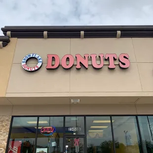 the front of a donut shop