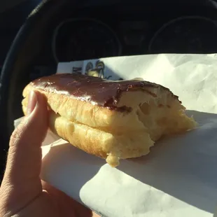 Terrible Bavarian filled cream bar cut like a hot dog bun to put the cold cream in the hard dry donut.