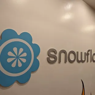 snowflakes logo on wall