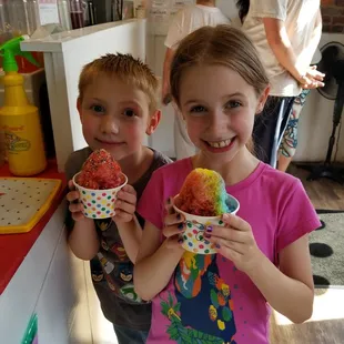 Nothing makes a kid happier than flavored cold stuff with sprinkles and glitter