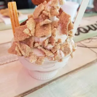 Milk tea ice cream taiyaki with cinnamon toast and vanilla wafer toppings