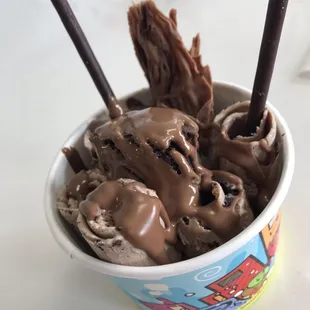 Custom Creation! Chocolate ice cream mixed with brownie, topped with chocolate syrup, brownie, chocolate pocky and a Chocoroll