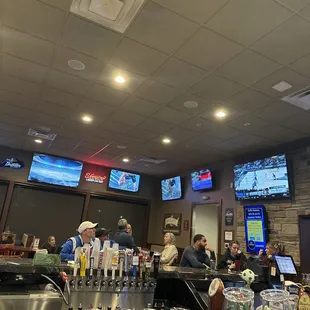 people sitting at the bar