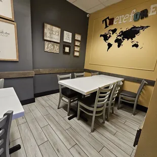 a table and chairs in a restaurant