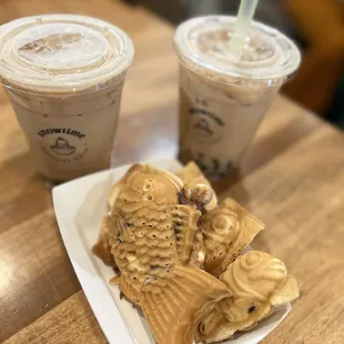 Milk teas with boba and 3 mini custard golden fish and one red bean regular golden fish