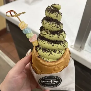 Fish cone with green tea soft serve, Oreo crumbs, and mochi