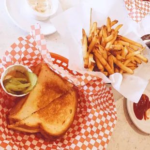 Definitely the best Snuffy's location! Grilled cheese and fries with a side of AMAZING seasoned sour cream