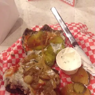 Plaza burger with sautéed onions, Swiss, chive sour cream on rye. Very tasty