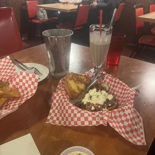 Bacon Cheeseburger with Blue cheese.  Odd combo but that's what my son wanted to try.  Notice the half milkshake it was a generous amount.