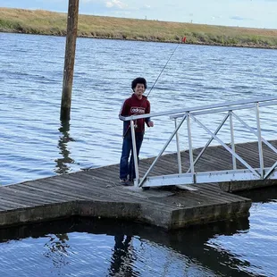 My 13 year old having a blast fishing