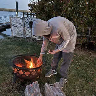 Hubby getting our fire started