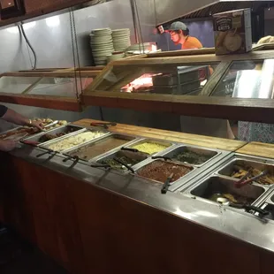 The meat, bread, and veggie part of the buffet.