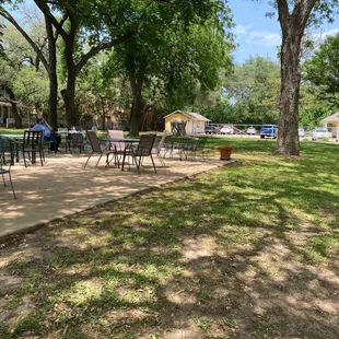 tables and chairs in a park